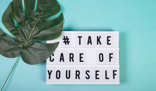 A picture of a board that says take care of yourself