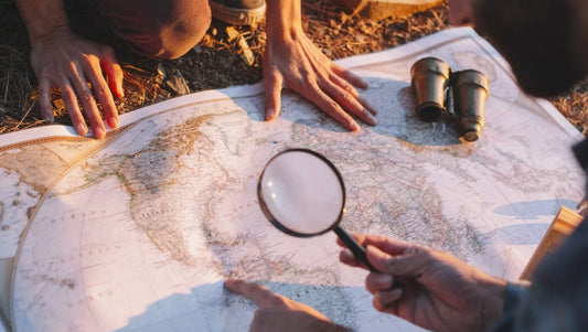 Ready to explore sex toys as a couple but don’t know where to start? Here are the best beginner sex toys for couples that spark connection and make trying new things exciting, not intimidating. A couple looking at a map exploring together