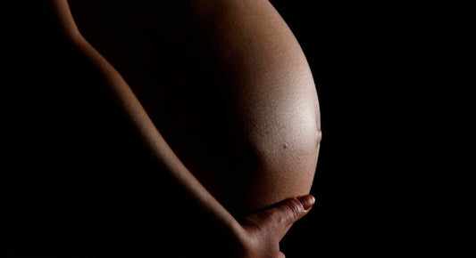 Becoming parents can shake up your sex life. These sex toys for parents to reconnect are all about rebuilding intimacy, rediscovering pleasure, and finding yourselves again. Pregnant women holding bump