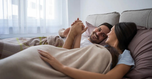 Meta Description: Sharing a bed with your partner isn’t always a dream. Here’s why separate beds — or even bedrooms — might be the secret to better sleep and a happier relationship. A couple in bed